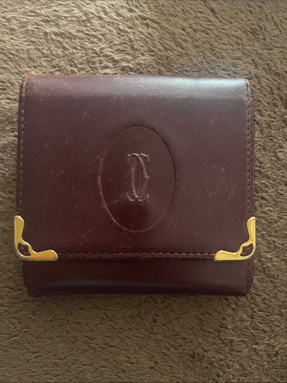 Cartier Burgundy Leather Wallet with Gold Accents